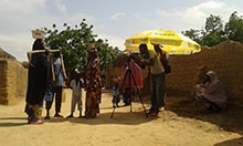 Videographers film a scene in the Sahel
