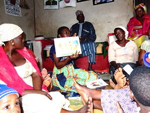 Parents attend a C-IYCF support group meeting in Benue State, Nigeria to learn about optimal nutrition practices.