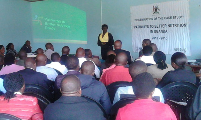 Nancy Adero, SPRING Technical Advisor for Anemia & Micronutrients, presents the PBN findings in Kisoro district. She urged districts to identify means of using conditional funds to strengthen funding for nutrition. PHOTO CREDIT: Adera Asasira, SPRING
