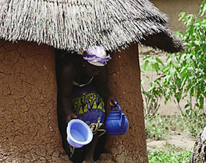 Photo of a woman using proper sanitation disposal.><img src=