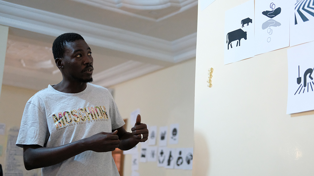 “Yesterday, we learned about interventions specific and sensitive, today we see how it all, together, contributes to nutrition.” Idrissa shares his group’s work telling the story of how agriculture and nutrition are linked. 