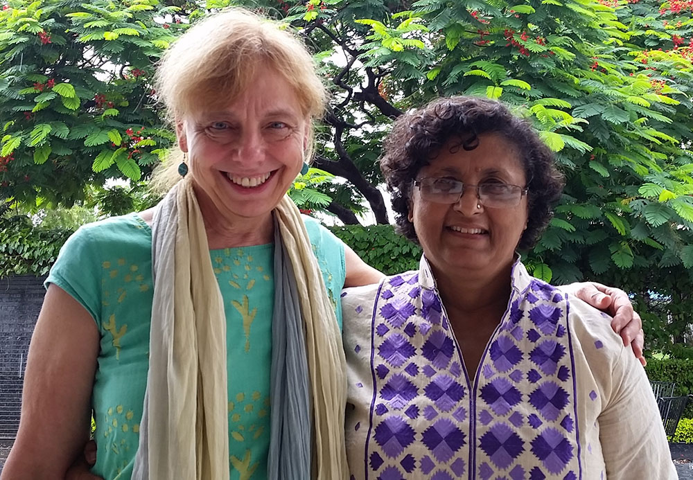 Peggy Koniz-Booher, SPRING Senior Nutrition and SBCC Advisor, meets with the Alive & Thrive representative, Dr. Nagendra Varada in Jharkhand, India.