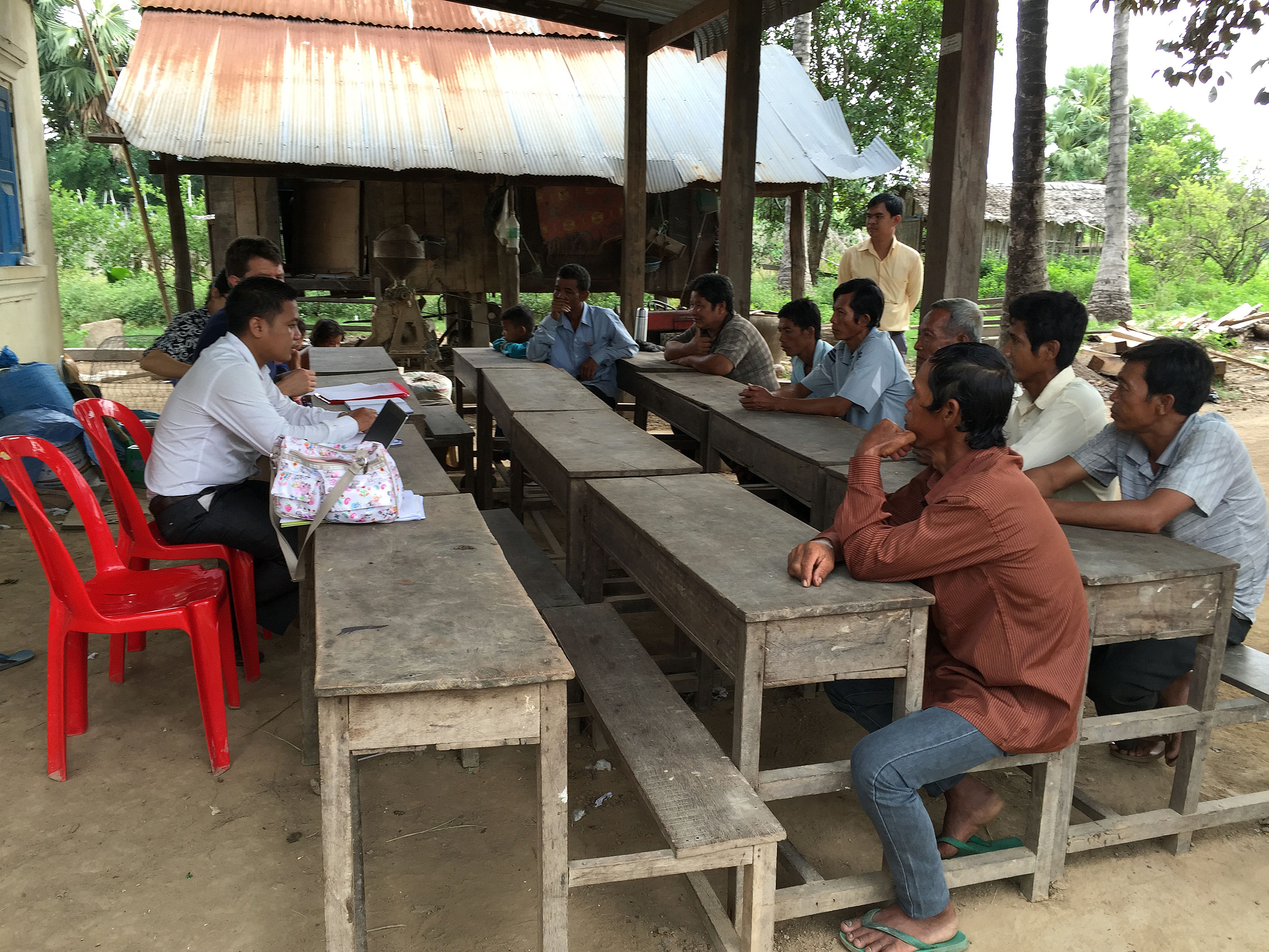 Male farmers meet during a focus group discussion in Cambodia.