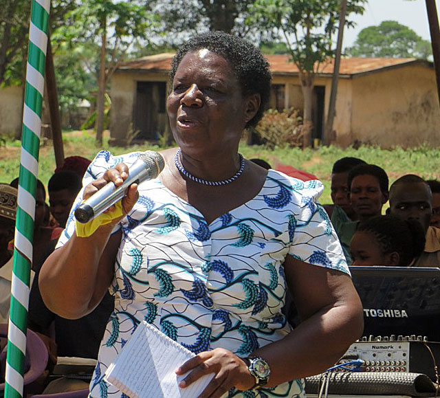 Hon. Florence Mutyabule, Area Women Member of Parliament, addresses the community members 