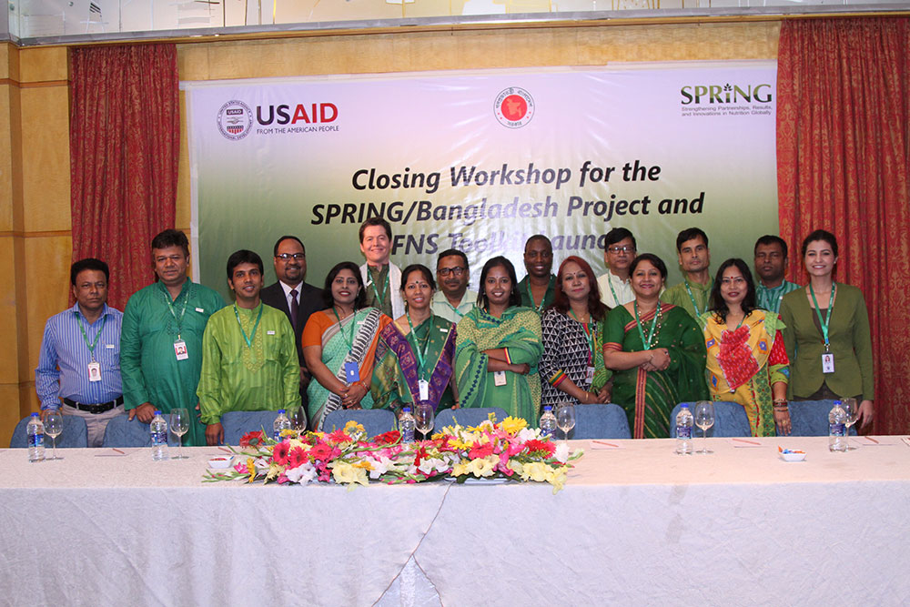 The SPRING/Bangladesh team shows off their green outfits at the end of the closing workshop.