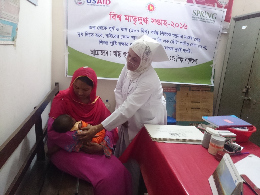 A woman breastfeeds at the breastfeeding corner at Abhaynagar upazila Health Complex