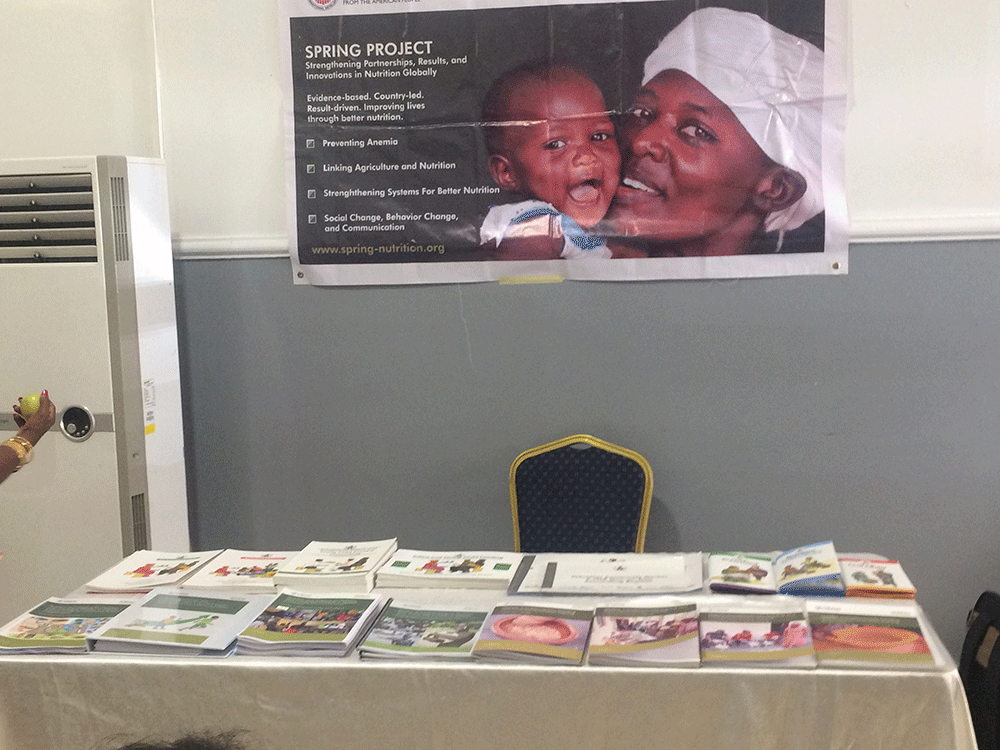 SPRING's materials -- including the translated Nigeria Infant and Young Child Feeding Counselling Package, Complementary Feeding and Food Demonstration Training, and the Nutrition and Hygiene for Orphans and Vulnerable Children in Nigeria: A Training for Community Based Organisations -- proudly showcased during the table walk.