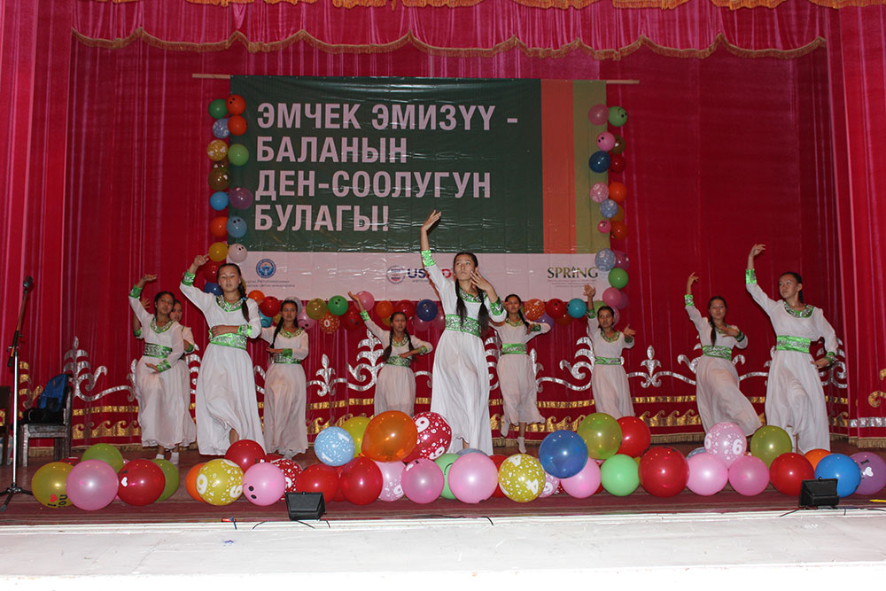 Local students dancing at the opening event