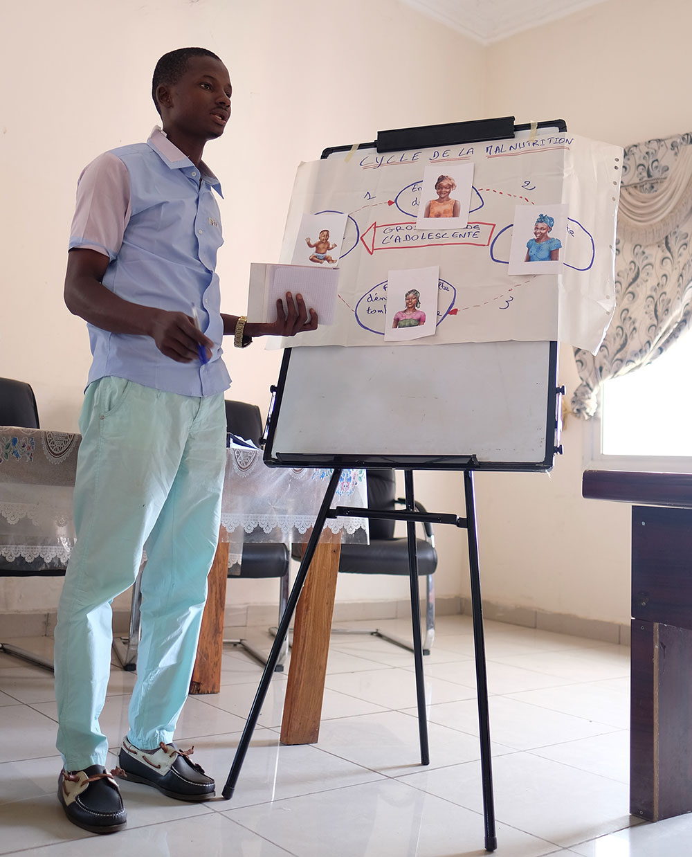 A participant, Diallo, examines how to break the cycle of malnutrition.