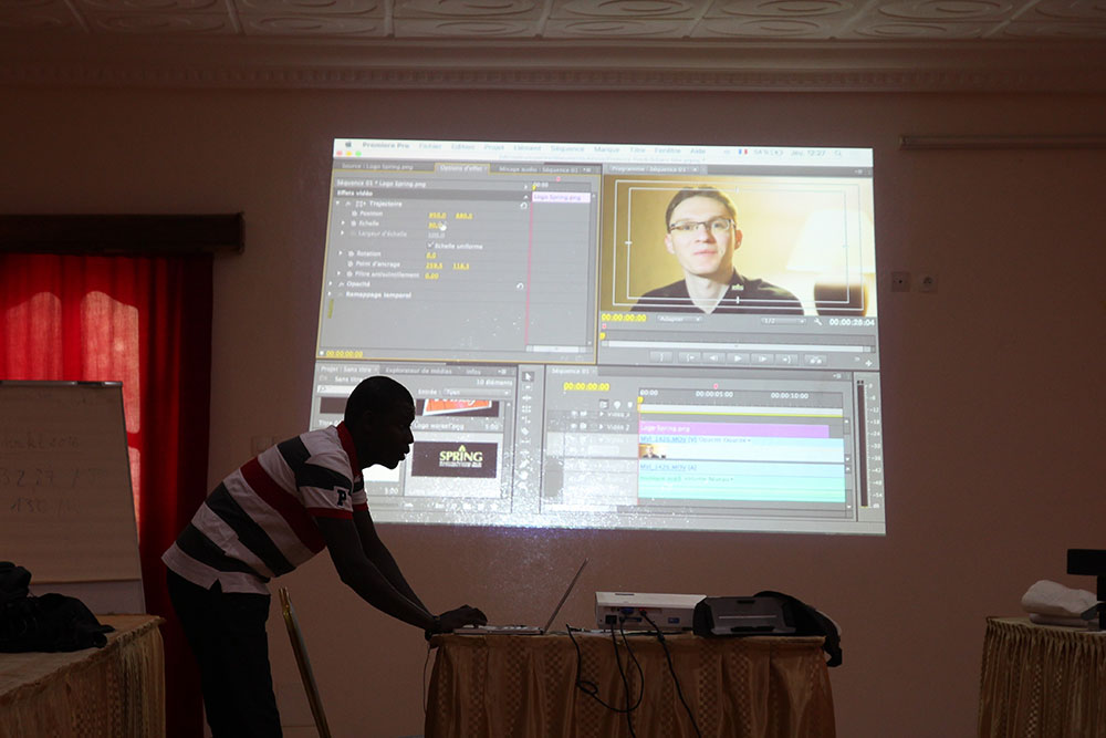 SPRING consultant Ahmed Massamba Thiam trains participants to use video editing software Adobe Premiere Pro.