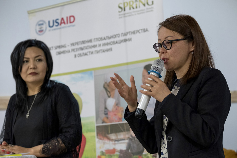 Deputy Governor Jarykyn Ibraeva addresses the audience, reflecting on SPRING's contribution to nutrition outcomes in Naryn oblast.