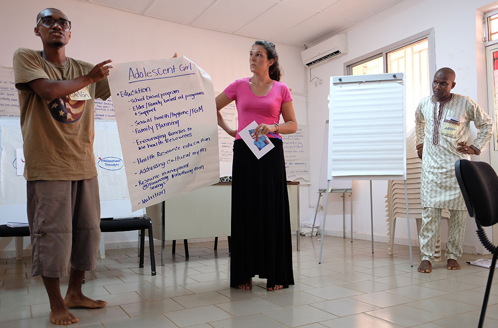Peace Corps volunteers, Danielle and DeVon, share their group’s work on how to break the cycle of malnutrition during the stage of adolescence. 