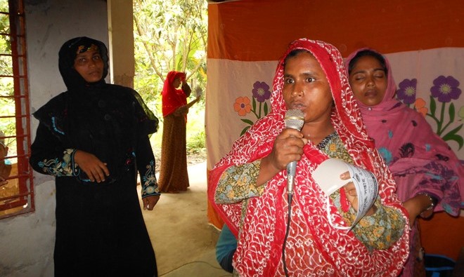 A woman shares her story at an event during World Breastfeeding Week in Bangladesh