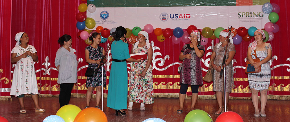 Selected audience members participating in a quiz on breastfeeding