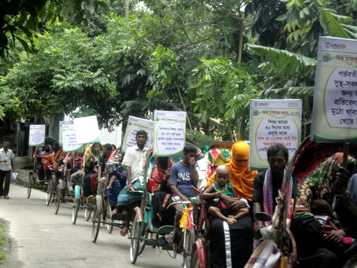 The Charkalmi Union of Charfession of Bhola District host a rickshaw rally during Bangladesh's 2014 celebrations.