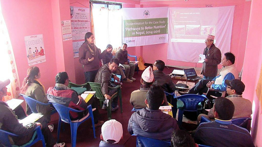 PBN Nepal team members Monica Biradavolu and Madhukar B. Shrestha present final district findings in Achham