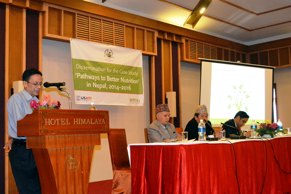 Co-Investigator Madhukar B. Shrestha presents the recommendations of the PBN Nepal case study alongside the Hon. Member, Former Hon. Member, and Joint Secretary of the National Planning Commission