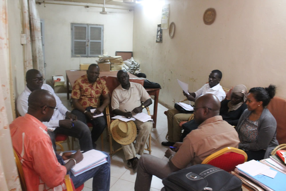 The SPRING/Senegal team and RIP FM staff exchange ideas regarding future collaborations.