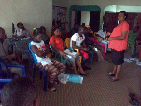 The Abi LGA Nutrition Focal Person addresses the CVs from Abi LGA during a meeting in IPGH’s office. 2015