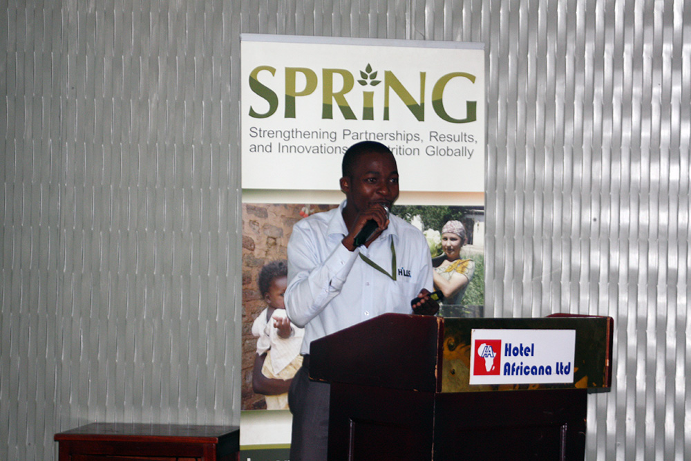 SPRING staff member Mike Mazinga presents on the current status of maize milling in Uganda.