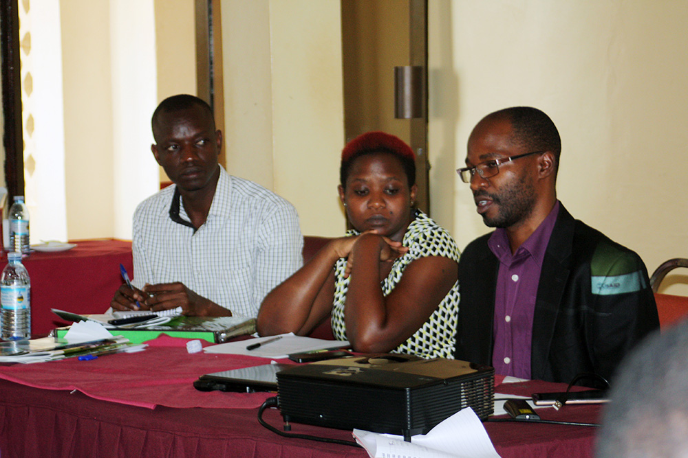 Toko Mansur and SPRING staff members Rose Nakiwala and Francis Ssebiryo participate in a panel discussion.