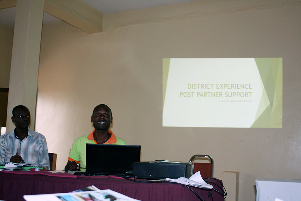 Siminyo Sabiti from Namutumba district (Magadi HC III) giving a presentation on implementation after the end of the SPRING pilot.