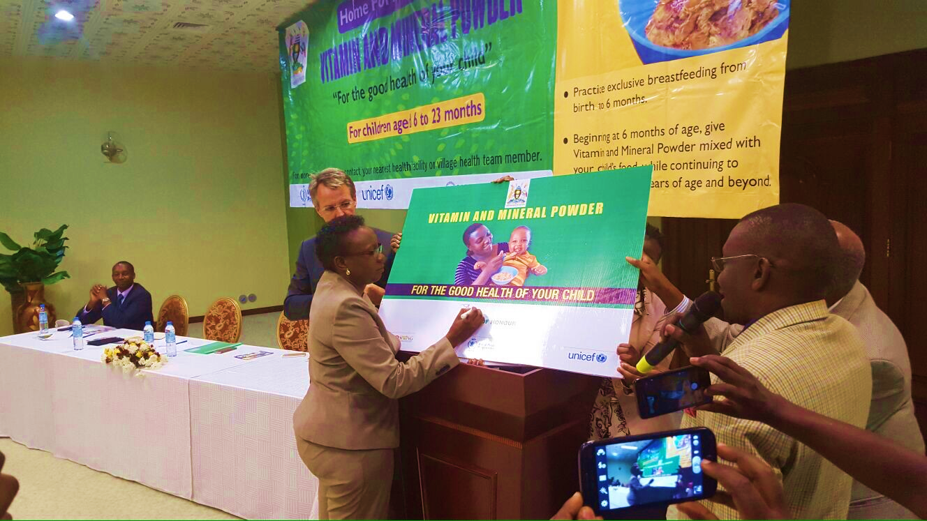 Dr. Jane Acheng unveils the Vitamin and Mineral Powder Program in Uganda (Photo credit: Abel Muzoora).