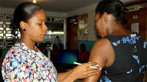 Miss Patricia Chéry conducts nutritional assessment with a client.