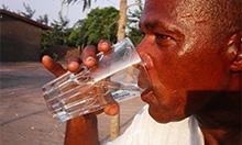 Photo of a man drinking water. Copyright 2001 Erberto Zani, Courtesy of Photoshare