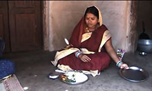 pregnant woman displaying an appropriate meal for pregnant women